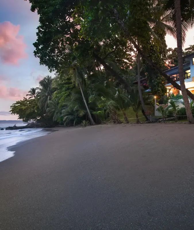Whispering Waves Luxury Retreat with 6BR-Infinity Pool and Walks to Beach from VILLAWAY®